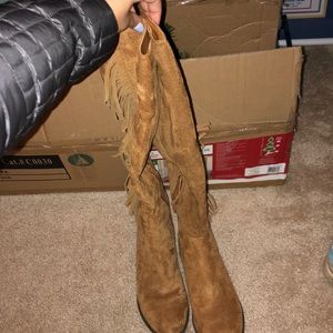 Tall fringe boots
